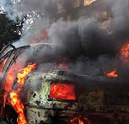 Car Catches Fire Outside Armenia's Parliament