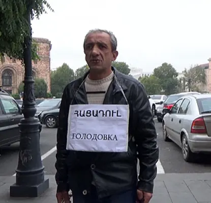 Locksmith Fighting to Get His Job Back Again Stages Protest Outside Government Office